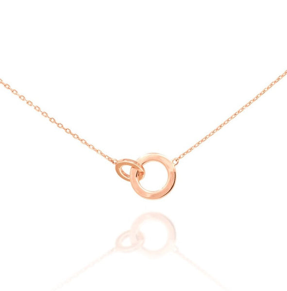 Rose gold plated on silver intertwined circle necklace with an adjustable chain and lobster clasp.