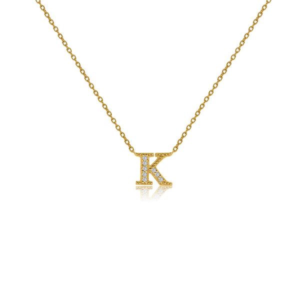 Gold plated on silver initial necklace with CZ decoration, featuring the letter 'K' on a fine linked chain and a sliding length adjuster.