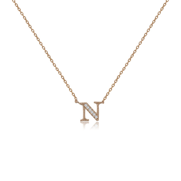 Rose gold plated initial 'N' necklace with cubic zirconia decoration  .