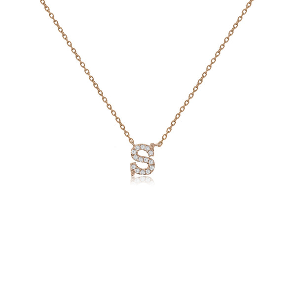 Rose gold plated initial necklace with cubic zirconia decoration and sliding length adjuster.