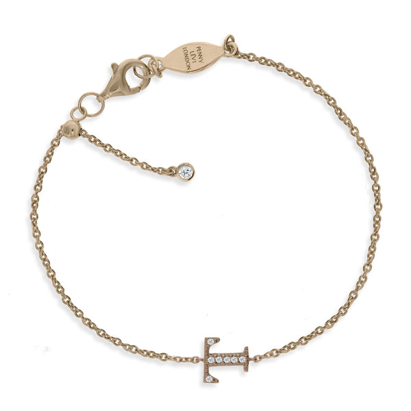 Close-up of a rose gold plated silver initial bracelet with a sliding size adapter and Cubic Zirconia (CZ) stones.