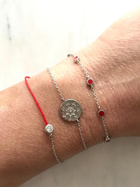 Sterling silver chain with intermittent red enamel beads.
