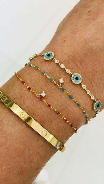 Gold plated on silver chain with turquoise beads and hanging CZ charm bracelet