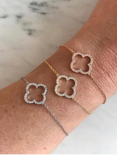 
Elegant gold plated on silver chain bracelet with a sparkling clover pave charm.

