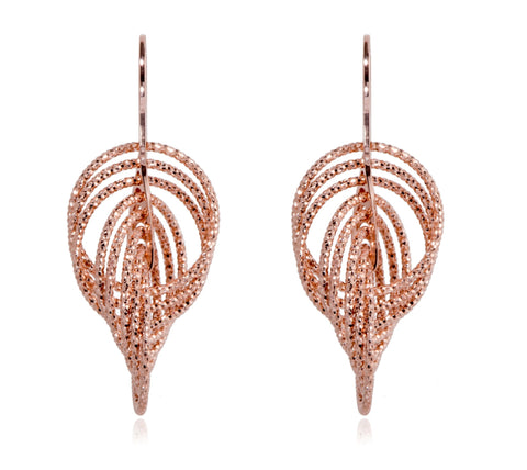 
Rose gold plated on silver large multi hoop intertwined diamond cut earrings, crafted in Italy with a diameter of 3.5 cm.

