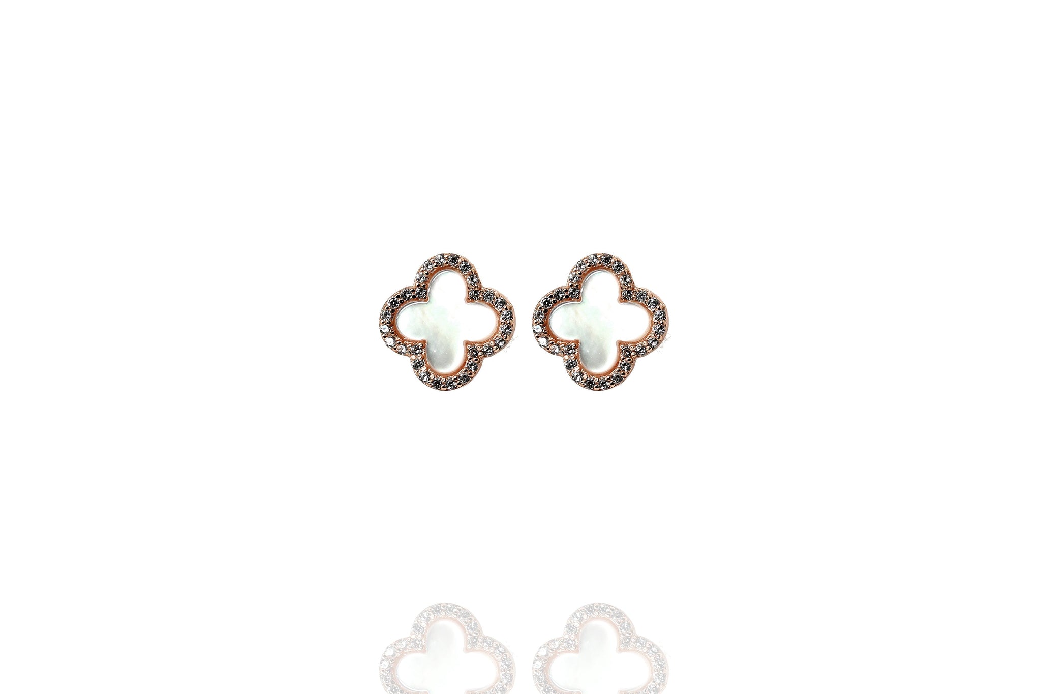 
Gold-plated silver Mother of Pearl clover stud earrings with cubic zirconia rim.

