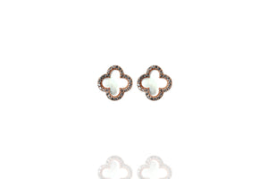 
Gold-plated silver Mother of Pearl clover stud earrings with cubic zirconia rim.

