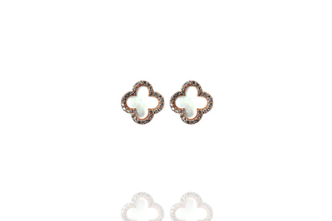 
Gold-plated silver Mother of Pearl clover stud earrings with cubic zirconia rim.

