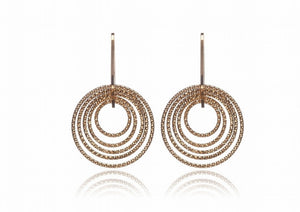 

Diamond cut gold plated single drop hoop earrings with five hoops, largest hoop 2 cm in diameter, made in Italy.

